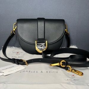 CHARLES & KEITH COLLECTION Gabine Leather Saddle Bag (Medium)